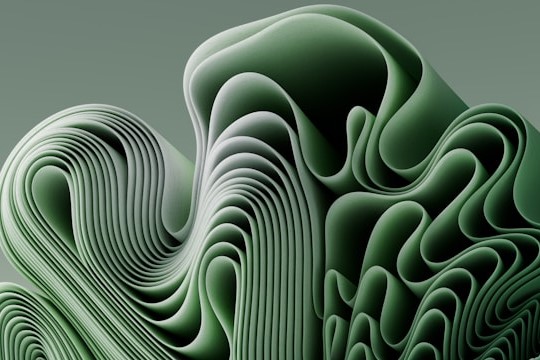 a computer generated image of a green wave